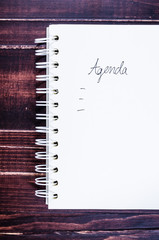 Concept of agenda record,notebook on wooden background - 88321969