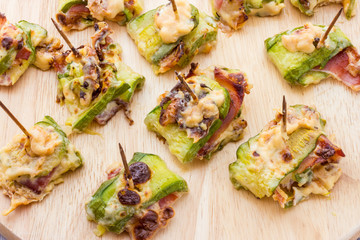 Zucchini and bacon rolls baked