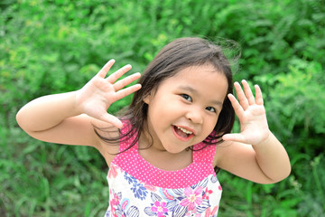 Outdoor Portrait of a Smiling Little Girl