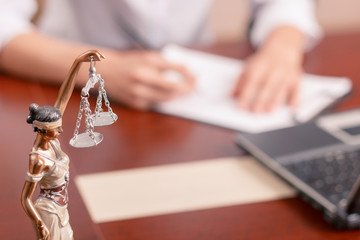 Professional lawyer signing documents