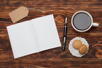Open Notepad. Cup Of Cofee. Macaroon Cookies. Wooden Background