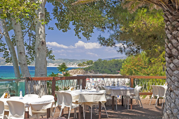 Fototapeta na wymiar Greek taverna by sea