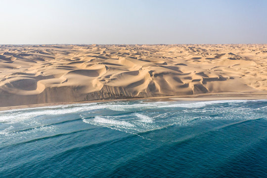 Namib desert, home to some of the most spectacular dunes of the world, continues right to the edge of the Atlantic Ocean, Namibia