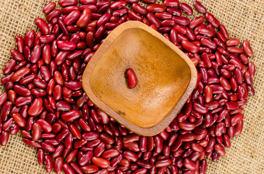 kidney bean in wooden bowl on sack cloth