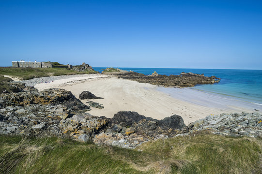 Corblets bay with Chateau A L'Etoc (Chateau Le Toc), Alderney, Channel Islands 