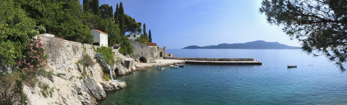 Panorama of rocky coast and harbour, Trsteno, Dubrovnik, Croatia 