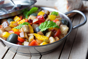  cooked vegetable salad made from chopped fried eggplant. Traditional sicilian dish.