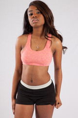 Fototapeta premium Thoughtful black woman in exercise outfit