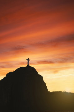 Statue of Christ the Redeemer at sunset, Corcovado, Rio de Janeiro, Brazil
