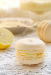 Homemade french macaroons with lemon curd