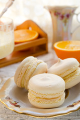 Homemade french macaroons with lemon curd