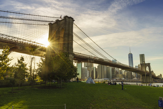 Brooklyn Bridge and Lower Manhattan skyline at sunset, New York City, New York