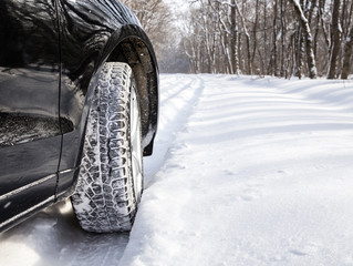 Driving car in winter with much snow