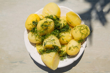 Boiled potatoes with herbs