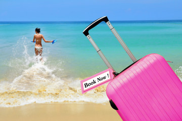 Book Now. suitcase with label.