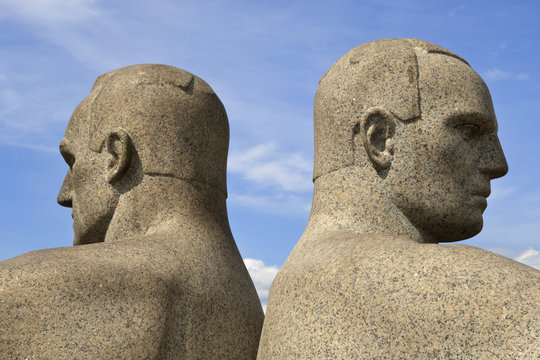 Back to back, detail of a sculptural group on the Monolith Plateau by Gustav Vigeland, Frogner Park, Oslo