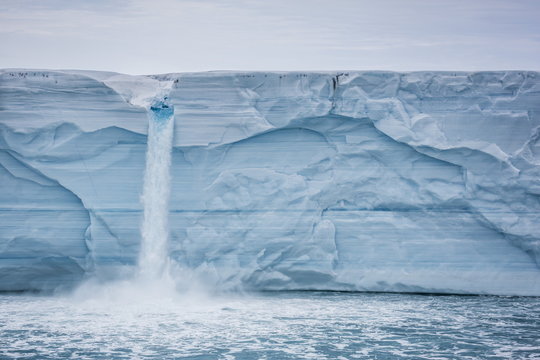 Melt water cascading off Austfonna, Nordaustlandet, Svalbard