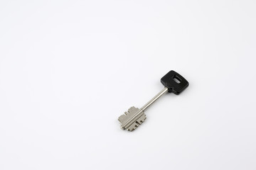 Door key on a white background