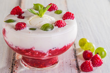 Ice cream with raspberry mousse and berries