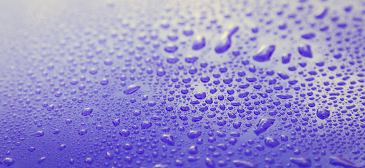 Drops of water on blue floor
