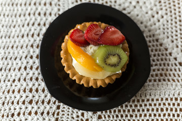 Close up of sweet cake with fruits