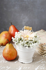 Floral arrangement with peach gerbera flower and gypsophila pani