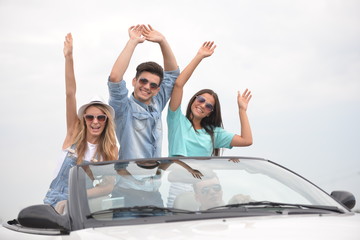 Friends in cabriolet