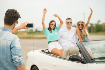 Friends in cabriolet