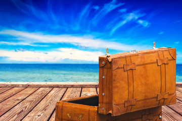 Vintage Suitcase at Boardwalk and Open Sea