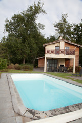 Fototapeta premium Swimming pool and lush vegetation