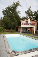 Swimming pool and lush vegetation