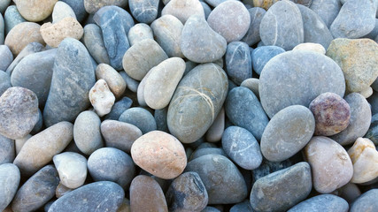 Fototapeta na wymiar Close up of Pebbles at a Beach