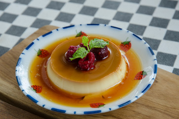 caramel custard dessert and red berry with honey