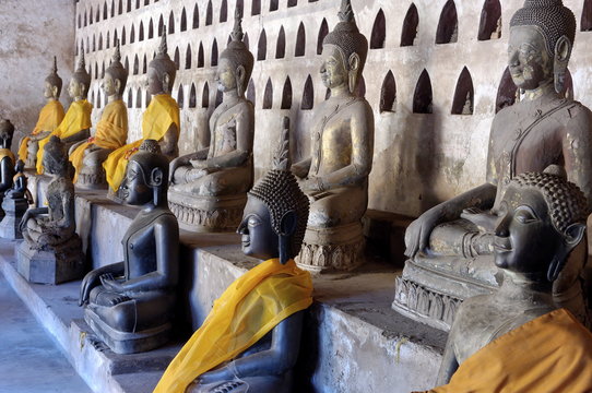 Buddha statues in the cloister or gallery surrounding the sim, Wat Sisaket, Vientiane, Laos