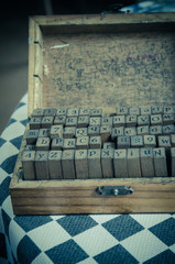 alphabets stamp in the box.