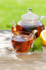 Breakfast tea on table in garden