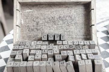 alphabets stamp in the box.
