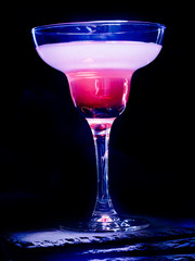 Pomegranate drink on black background 70.