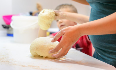 Little boy helping with the baking