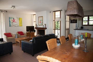 Modern, bright, clean, living room   in a  house