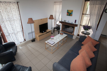 Modern, bright, clean, living room   in a  house