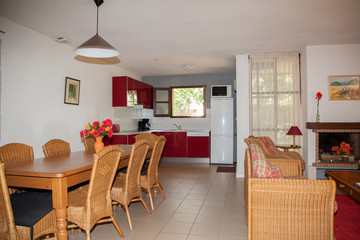 Modern, bright, clean, kitchen interior with stainless steel appliances in a luxury house