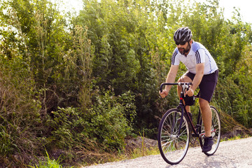 Fototapeta na wymiar road bike with a cyclist pedaling