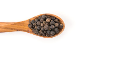 Black pepper with wood spoon