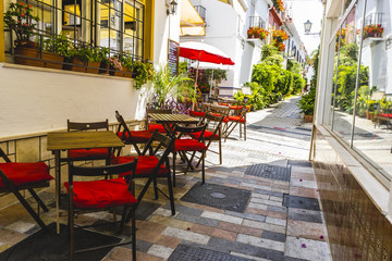 streets of Marbella restaurant tables, Spain