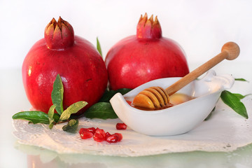 symbols of holiday of Rosh Hashanah - honey and pomegranate