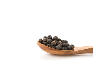 Black pepper with wood spoon