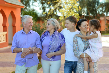 Family relaxing at vacation resort