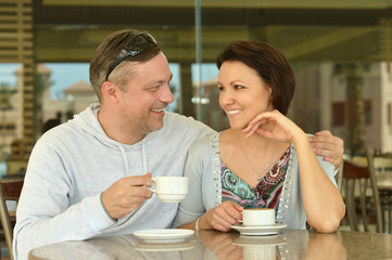Happy couple with coffee