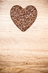 Raw flax seeds linseed heart shaped